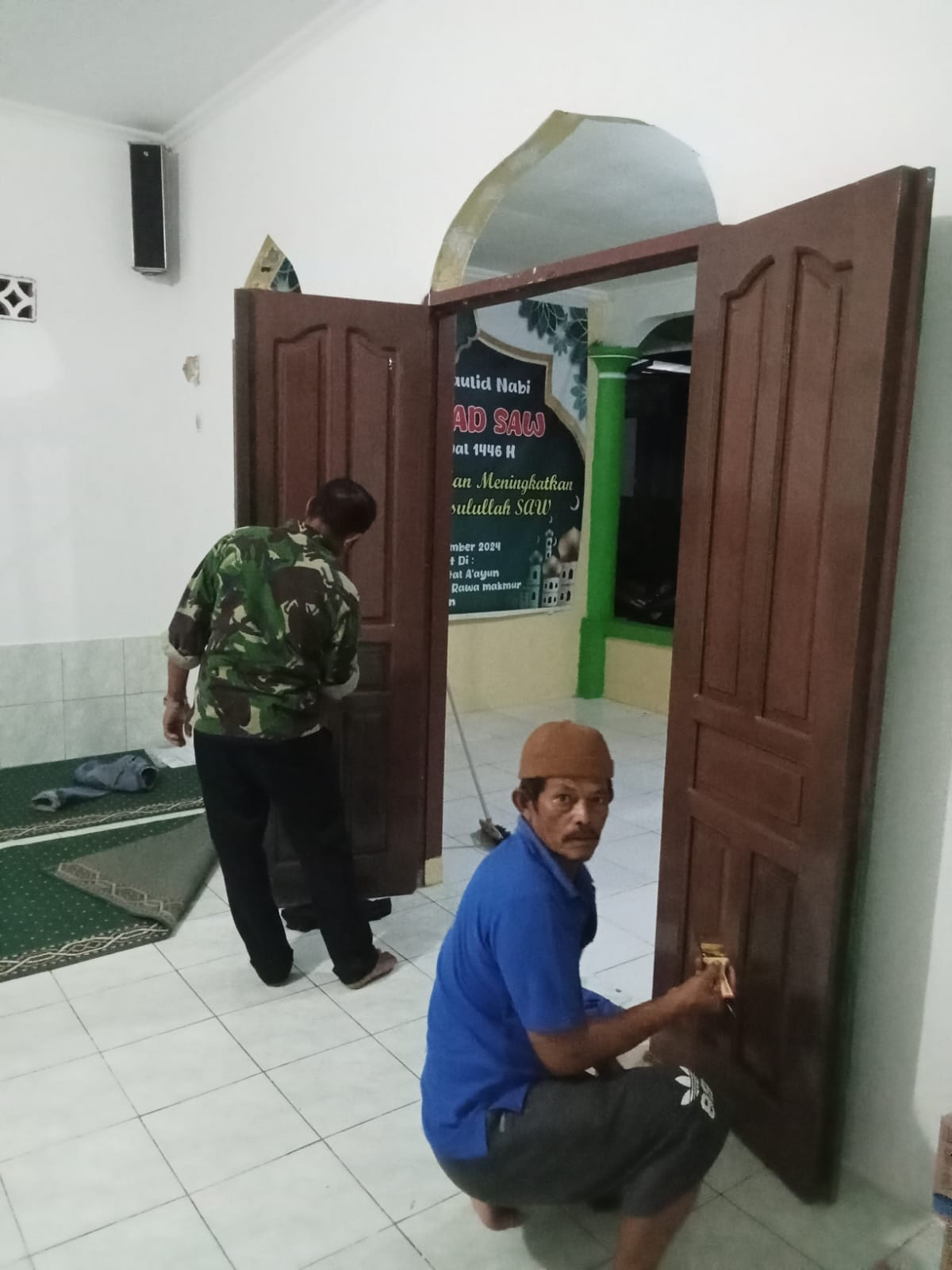 Pengecatan langgar qurotul a.yun jln. Rengganis Rt 44