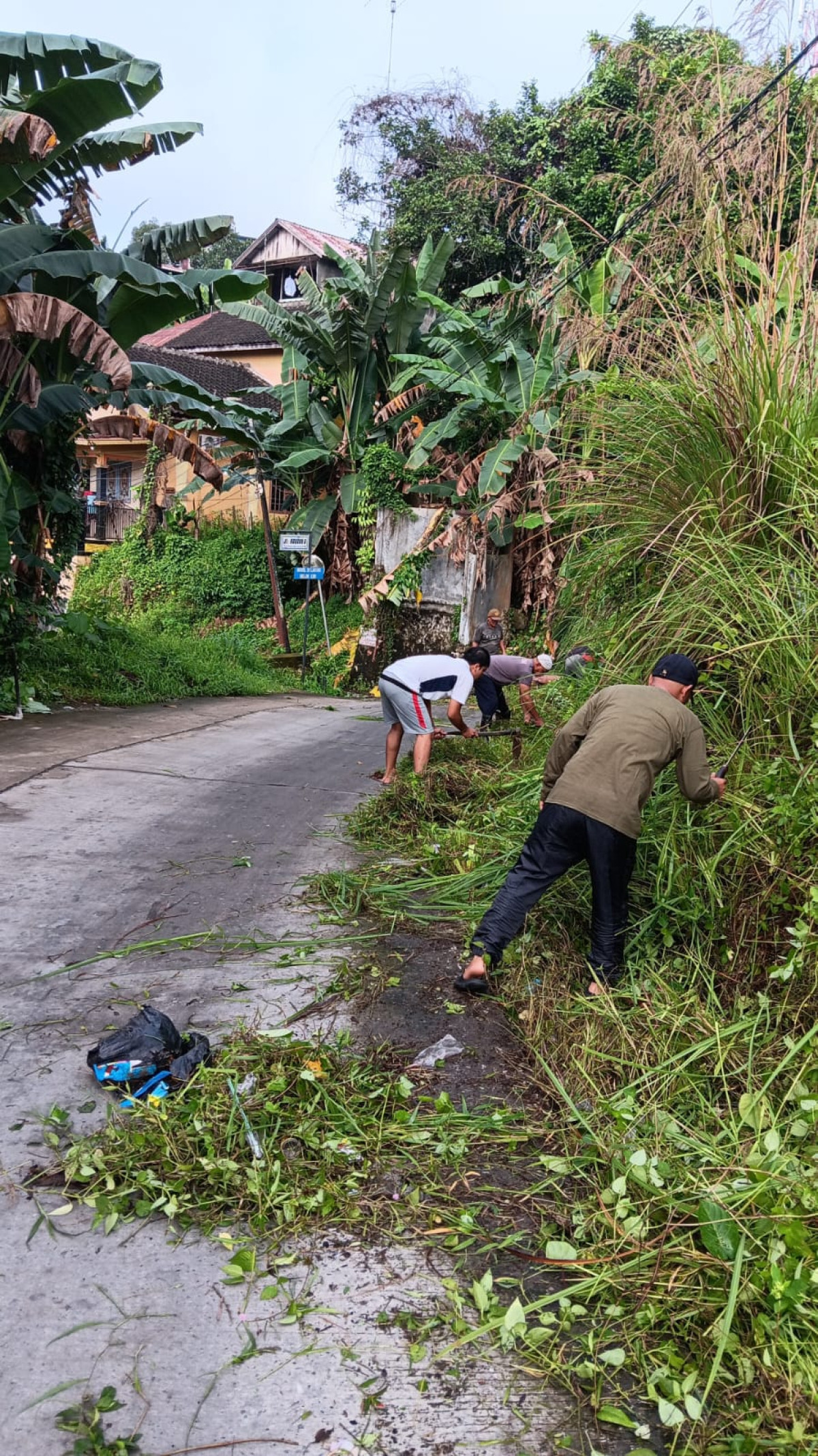 kerja bakti jln.h.m.basou