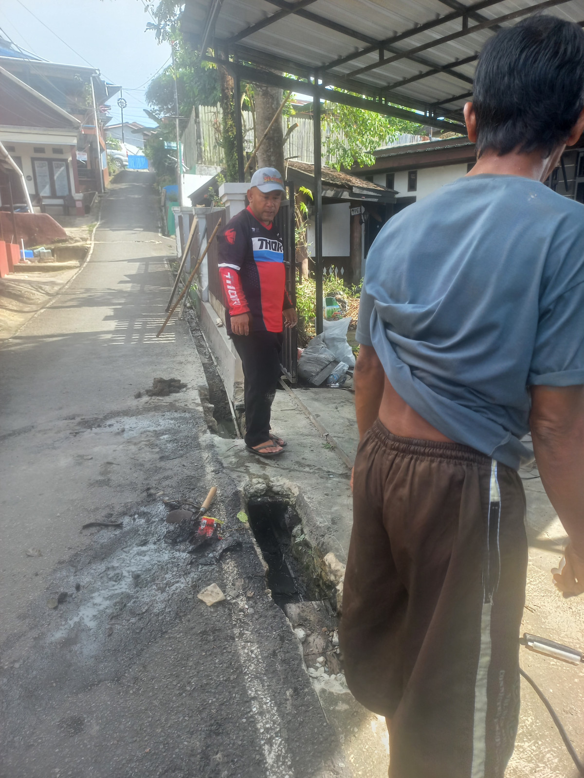 Perbaikan parit lingkungan