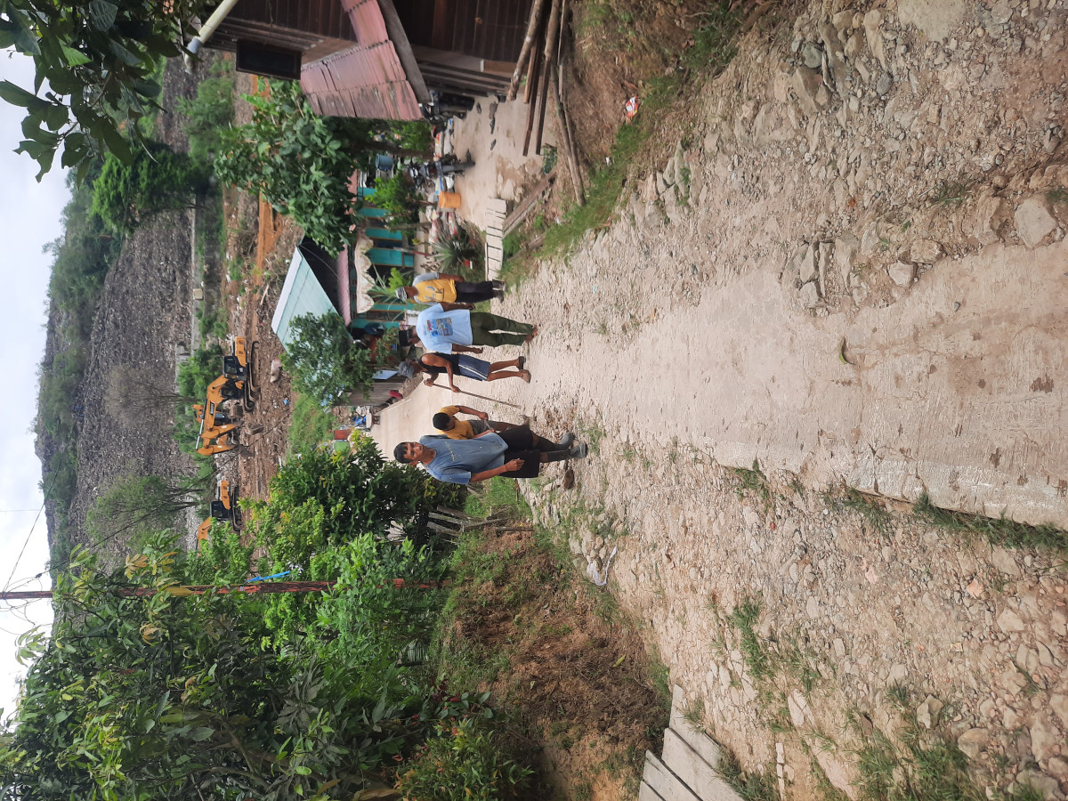 Pengecoran jalan gang battan