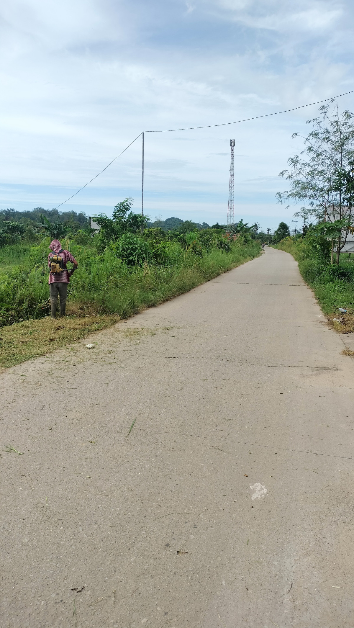 Jalan poros RT 31