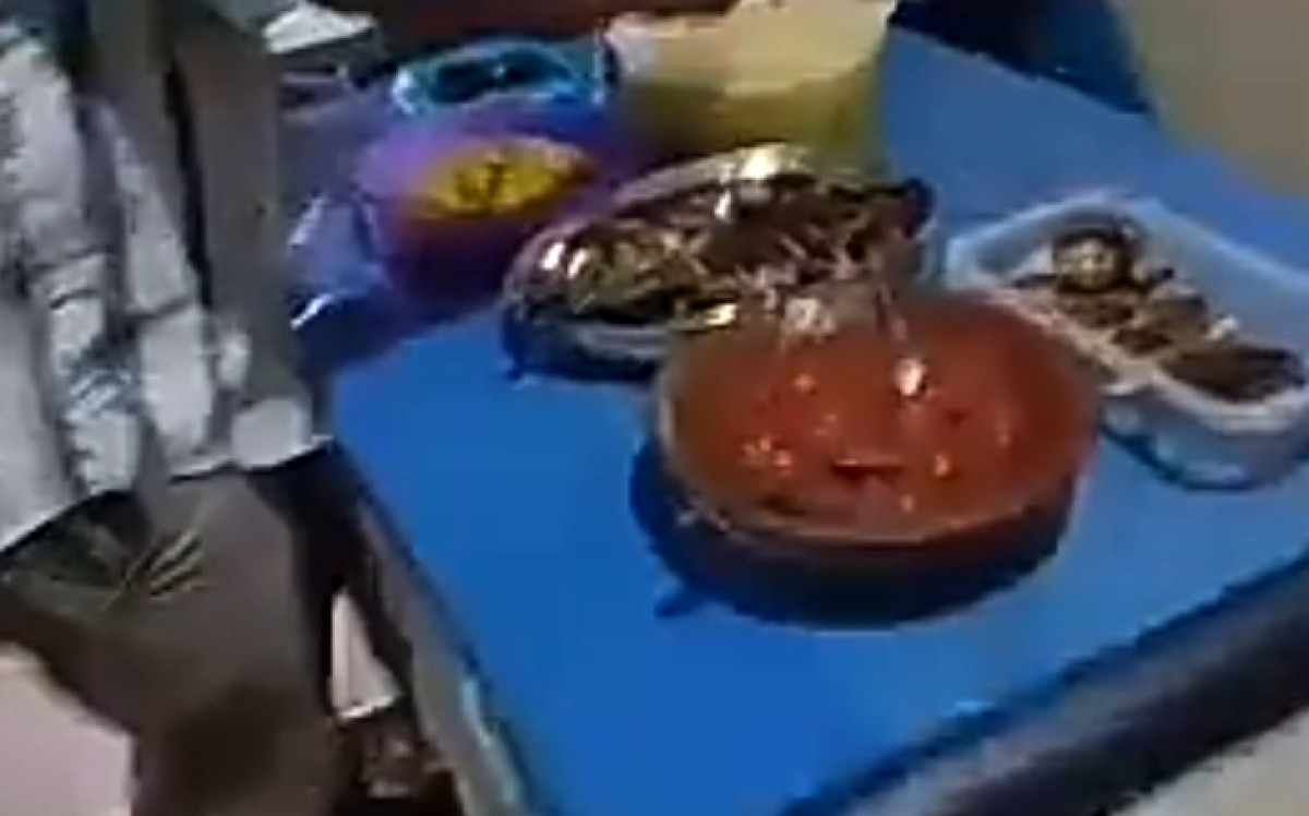 Membersihkan parit dan lingkungan musholla