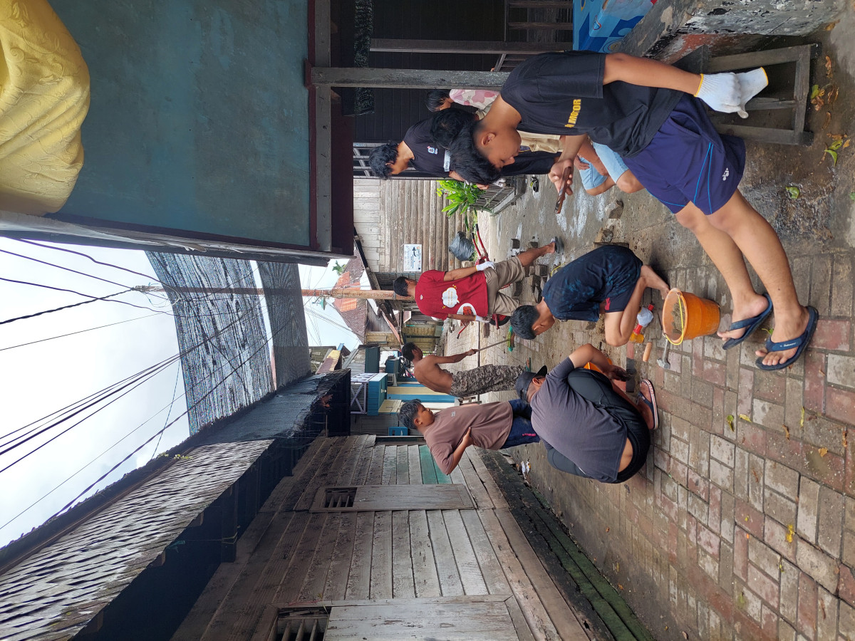 Perbaikan jalan paving blok