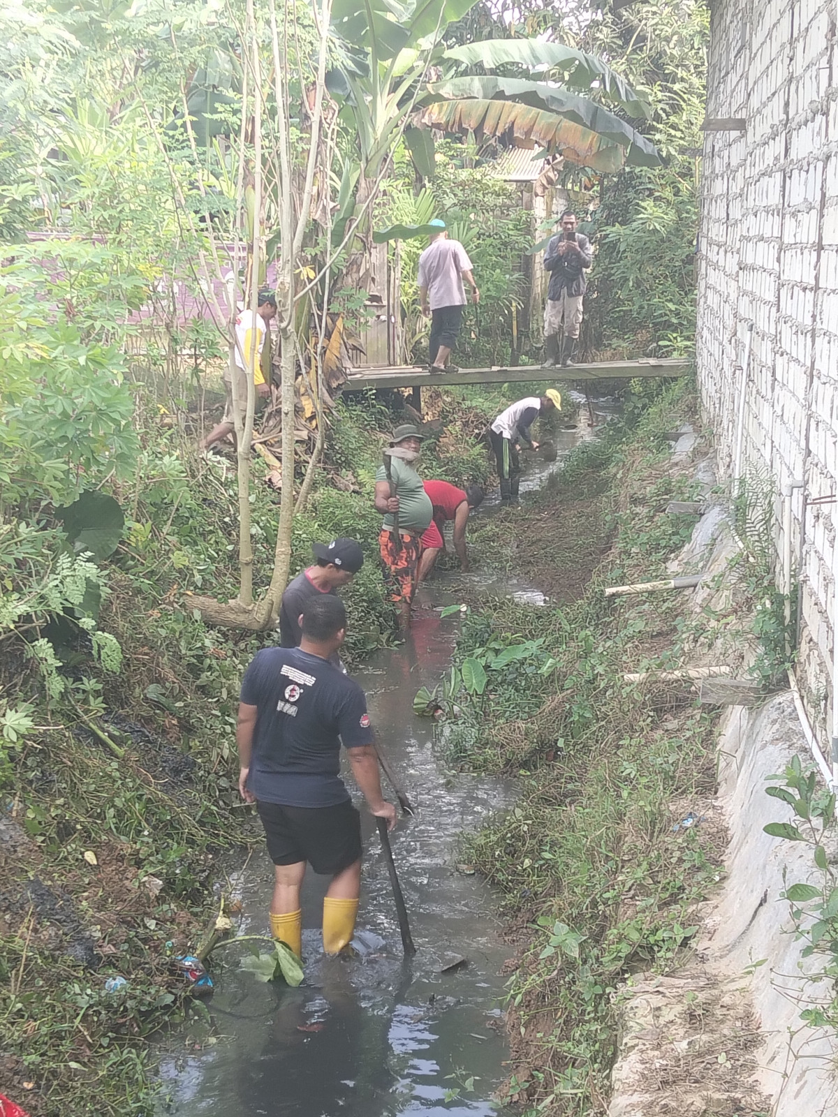 Gotong royong di jln Syahrani dahlan Gg.padaidi RT 35